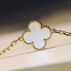 CLOVER 20 MOTIFS WHITE MOP NECKLACE