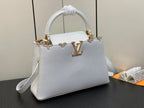 CAPUCINES MM 31 WHITE TAURILLON GOLD HARDWARE