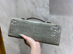 KELLY CUT 31 IN ASH GRAY SHINNY ALLIGATOR LEATHER WITH SILVER HARDWARE (MADE-TO-ODER)