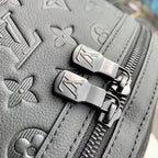 DISCOVERY PM BACKPACK 38 IN BLACK MONOGRAM LAMBSKIN