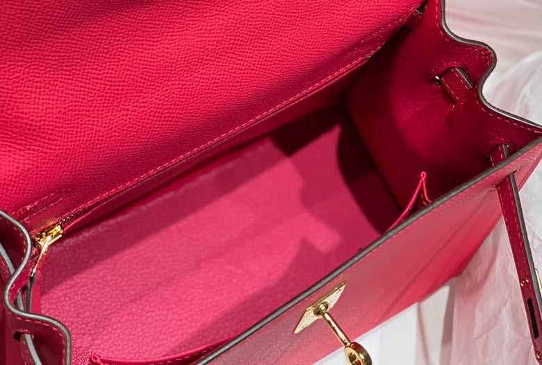 KELLY 25CM IN ROSE TYRIEN SWIFT CALFSKIN GOLD HARDWARE