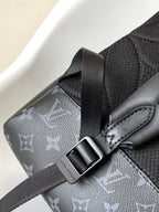 DISCOVERY BACKPACK 41 IN BLACK MONOGRAM MACASSAR CANVAS AND CALFSKIN