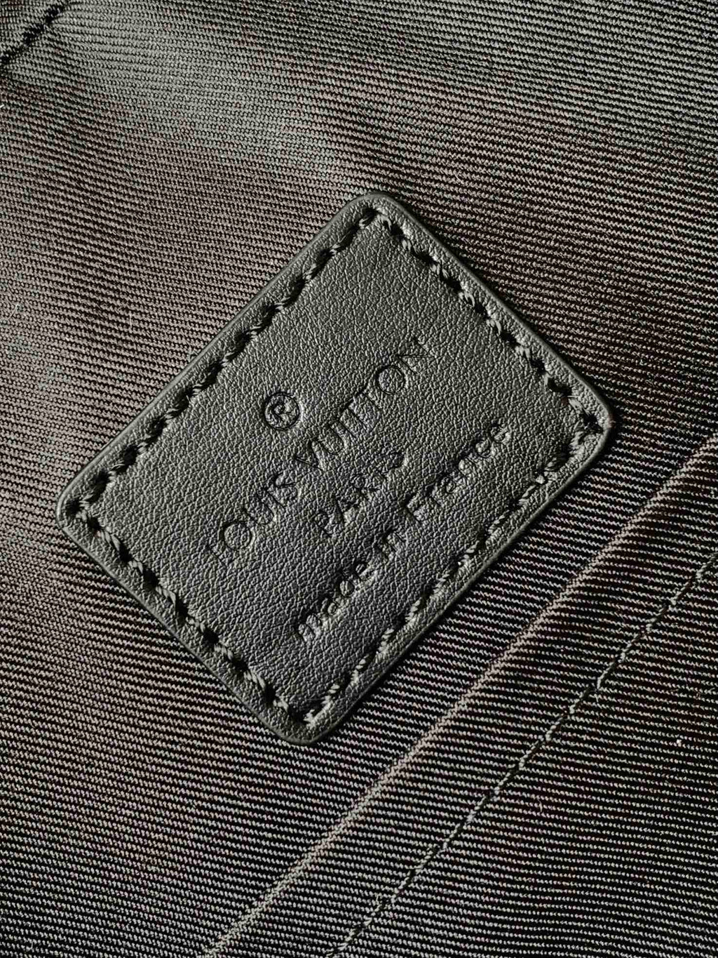 DISCOVERY BACKPACK 41 IN BLACK MONOGRAM MACASSAR CANVAS AND CALFSKIN
