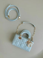 MINI D-JOY BAG 17 IN LIGHT BLUE LAMBSKIN
