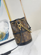 CANOÉ 20 IN BROWN MONOGRAM CANVAS GOLD HARDWARE