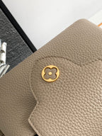CAPUCINES MINI 21 IN KHAKI BROWN TAURILLON GOLD HARDWARE