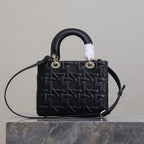 LADY BAG 24 IN BLACK GRAPHIC CANNAGE CALFSKIN PALE GOLD-FINISH METAL CHARMS