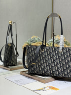MEDIUM 37 TOUJOURS BAG IN BLACK MONOGRAM DENIM