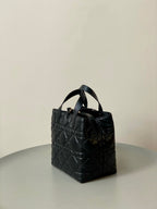 MEDIUM TOUJOURS BUCKET BAG 22 IN BLACK CANNAGE CALFSKIN