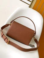 SOFT TWIST 27 IN COGNAC CALFSKIN GOLD LOGO