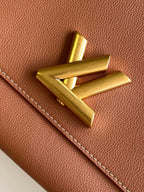 SOFT TWIST 27 IN COGNAC CALFSKIN GOLD LOGO