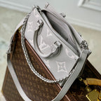 ONTHEGO EAST WEST BAG 25 IN BICOLOR MONOGRAM EMPREINTE LEATHER