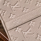 KEEPALL BANDOULIÈRE 34 BAG IN LIGHT BROWN MONOGRAM TAURILLON CALFSKIN