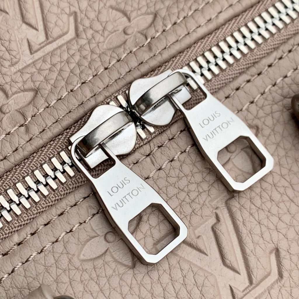 KEEPALL BANDOULIÈRE 34 BAG IN LIGHT BROWN MONOGRAM TAURILLON CALFSKIN