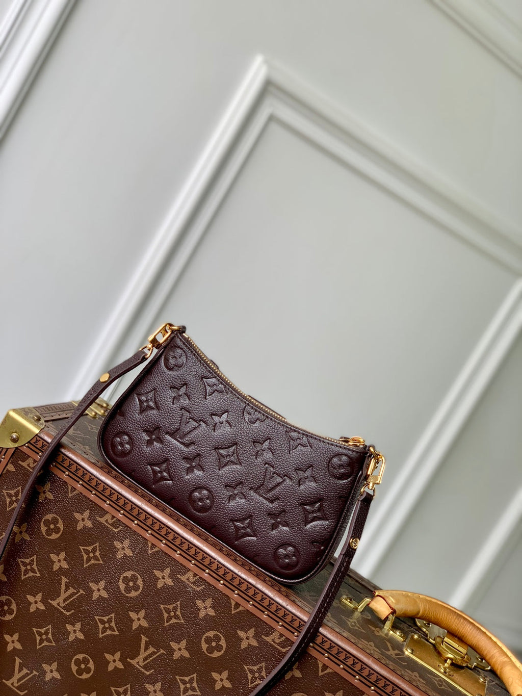 EASY POUCH ON STRAP 19 IN DARK BROWN MONOGRAM EMBOSSED LOGO CALFSKIN