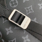 DISCOVERY SLIM BACKPACK 38 IN BLACK MONOGRAM ECLIPSE COATED CALFSKIN