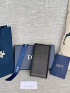 VERTICAL BIFOLD WALLET 19 IN BLACK GRAINED CALFSKIN MIX BLUE MONOGRAM OBLIQUE JACQUARD