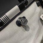 HERBAG A DOS ZIP RETOURNE BACKPACK 29 IN OFF-WHITE MIX BLACK CANVAS AND CALFSKIN