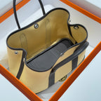 GARDEN PARTY 30CM IN DARK BEIGE TOILETS COTTON CANVAS AND BLACK CALFSKIN