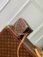 MINI SOFT TRUNK 18 IN BROWN MONOGRAM MACASSAR CANVAS