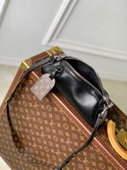 POCHETTE VIBE HANDBAG 25 IN BLACK LAMBSKIN BROWN COWHIDE AND COATED CANVAS TRIM