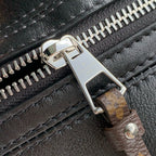 POCHETTE VIBE HANDBAG 25 IN BLACK LAMBSKIN BROWN COWHIDE AND COATED CANVAS TRIM