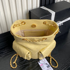 CRUISE DRAWSTRING BACKPACK 24 IN YELLOW LAMBSKIN GOLD-TONE METALLIC