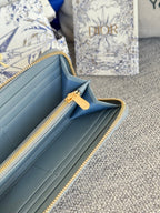 VERTICAL LONG ZIP WALLET 20 IN BABY BLUE QUILTED ALLOVER CALFSKIN