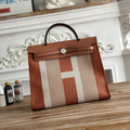 ZIP CABINE 31 BAG IN BRONZE BROWN MIX WHITE CANVAS AND CALFSKIN