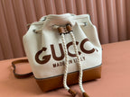 SMALL DRAWSTRING SHOULDER BAG 21 IN WHITE CANVAS BROWN CALFSKIN