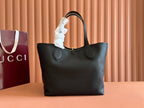 MEDIUM TOTISSIMA REVERSIBLE TOTE BAG 30 IN BLACK CALFSKIN BEIGE AND BROWN GG CANVAS ON SIDE