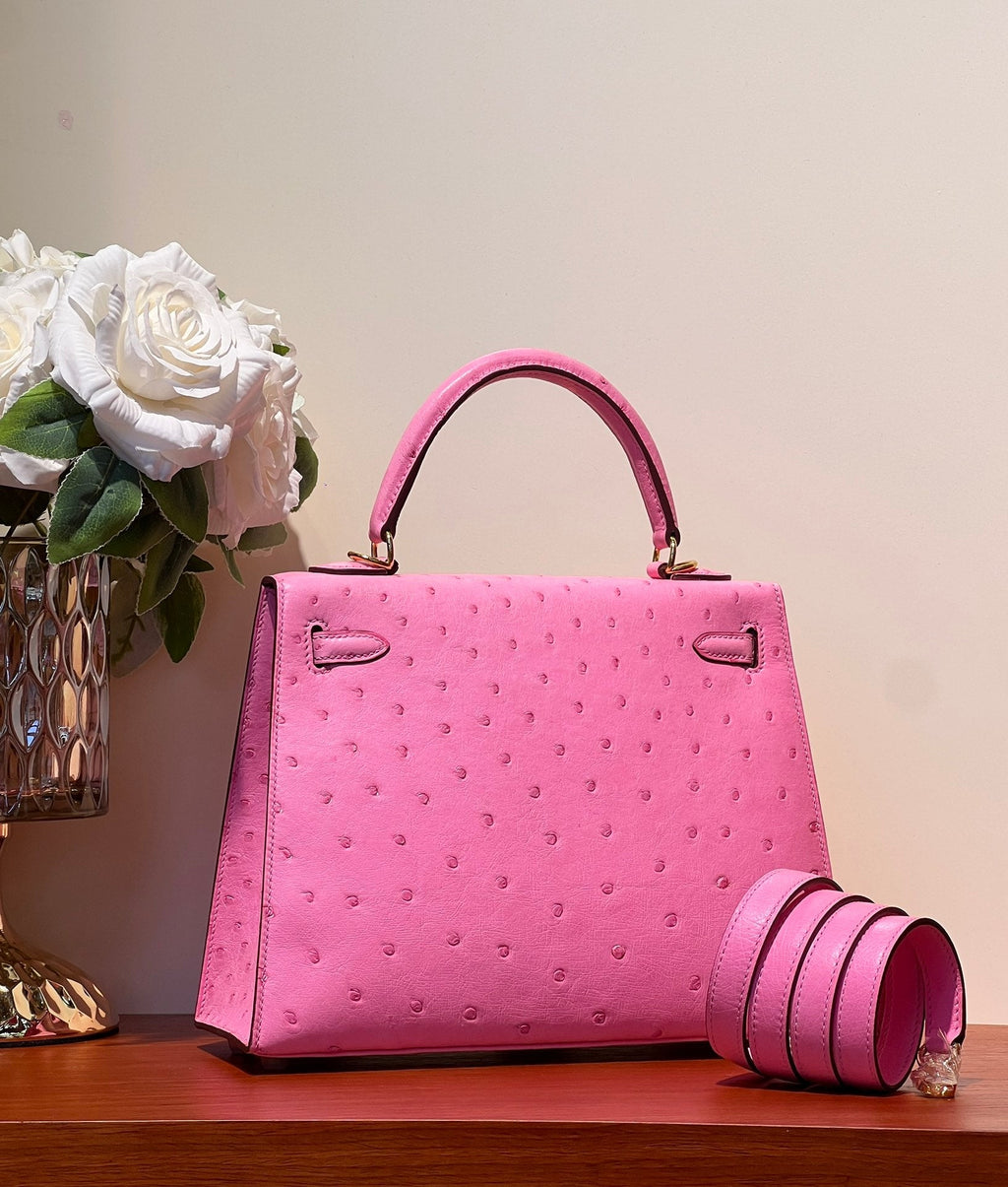 KELLY SELLIER 25 BAG IN DOLL PINK OSTRICH LEATHER WITH GOLD HARDWARE (MADE-TO-ODER)