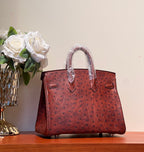 KELLY SELLIER 25 BAG IN BERRY RED OSTRICH LEATHER WITH GOLD HARDWARE (MADE-TO-ODER)