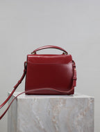 CASSANDRA MINI TOP HANDLE BAG 20 IN RED CALFSKIN GOLD HARDWARE