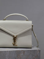CASSANDRA TOP HANDLE BAG 24 IN WHITE CALFSKIN GOLD HARDWARE